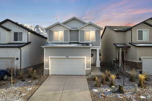 Craftsman-style house featuring a garage