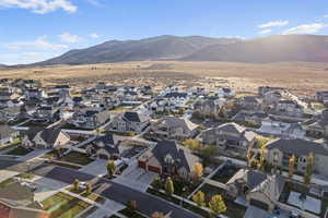 Birds eye view of property with a mountain view