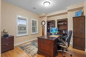 Office featuring light hardwood / wood-style flooring