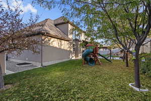 View of yard with a playground