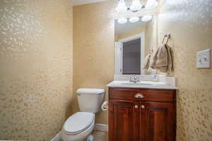 Bathroom with vanity and toilet