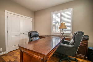 Office with hardwood / wood-style floors