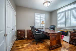 Office area with wood-type flooring