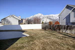 View of yard featuring a patio area and a mountain view