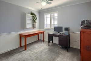 Office featuring ceiling fan, light colored carpet, and ornamental molding