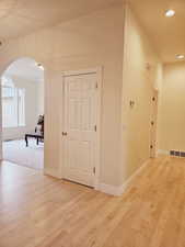 Hallway featuring light wood-type flooring