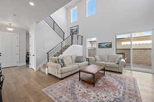 Living room with light wood-type flooring