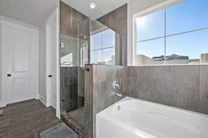 Bathroom with plus walk in shower