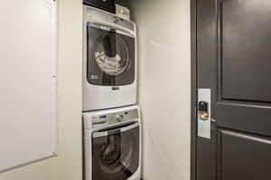 Laundry area with stacked washer / dryer