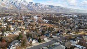 Birds eye view of property with a mountain view