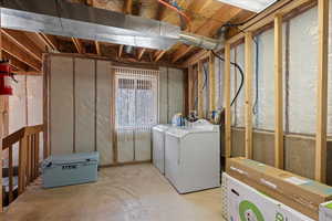 Basement featuring independent washer and dryer