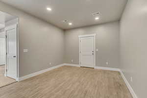 Dining area with light wood-type flooring