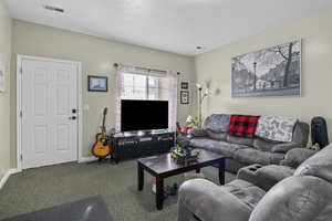 View of carpeted living room