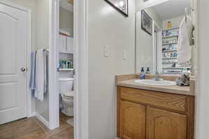 Bathroom featuring vanity and toilet