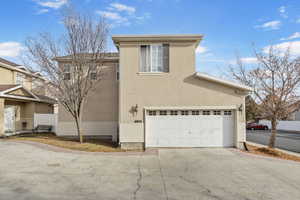 Front of property with a garage