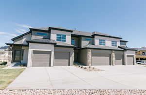 Prairie-style house with a garage