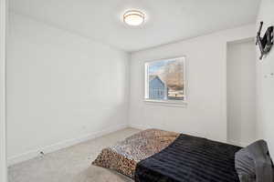 Bedroom with carpet flooring