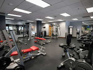 Workout area with a paneled ceiling