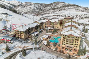 Snowy aerial view with a mountain view