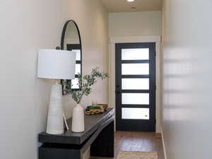 Entryway featuring dark hardwoodfloors