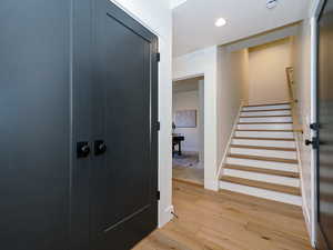 Large closet and wood stairs