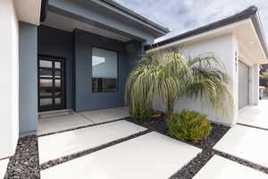 Property entrance with a garage