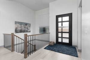 Foyer with light wood-type flooring