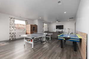 Playroom featuring hardwood / wood-style floors and ceiling fan