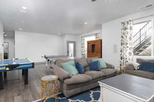 Living room featuring wood-type flooring