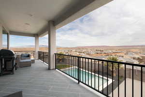 Balcony featuring a grill and a mountain view