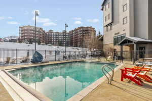 View of pool with a patio area