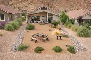 Rear view of house featuring a patio