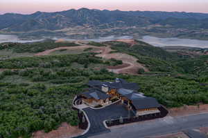 Aerial view at dusk of a water and mountain view