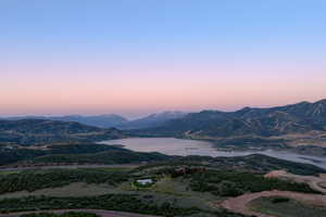 View of mountain backdrop with a nearby body of water