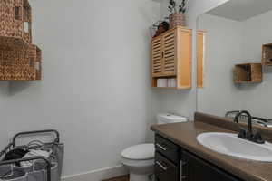 Bathroom with vanity and toilet