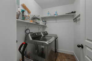 Laundry area featuring independent washer and dryer