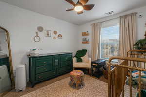 Bedroom featuring ceiling fan