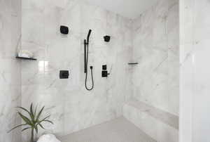 Bathroom featuring tiled shower