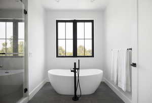 Bathroom featuring tile patterned floors and plus walk in shower