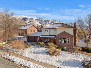 Front of property with a mountain backdrop