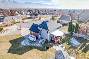 Birds eye view of property featuring a mountain view