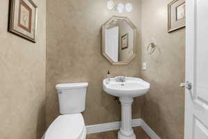 Bathroom featuring toilet and sink