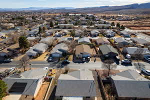 Birds eye view of property with a mountain view