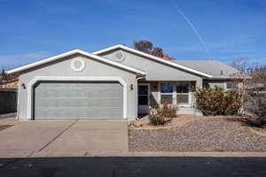 Ranch-style home with a garage