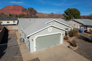 Exterior space with a mountain view and a garage