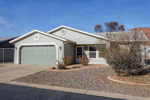 Ranch-style house with a garage