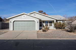 Single story home with a garage