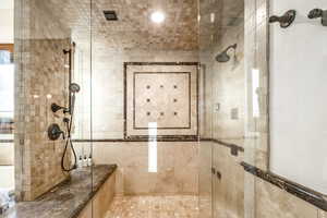 Bathroom featuring walk in shower