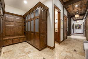 Mudroom featuring wood ceiling