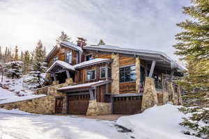 View of front facade featuring a garage